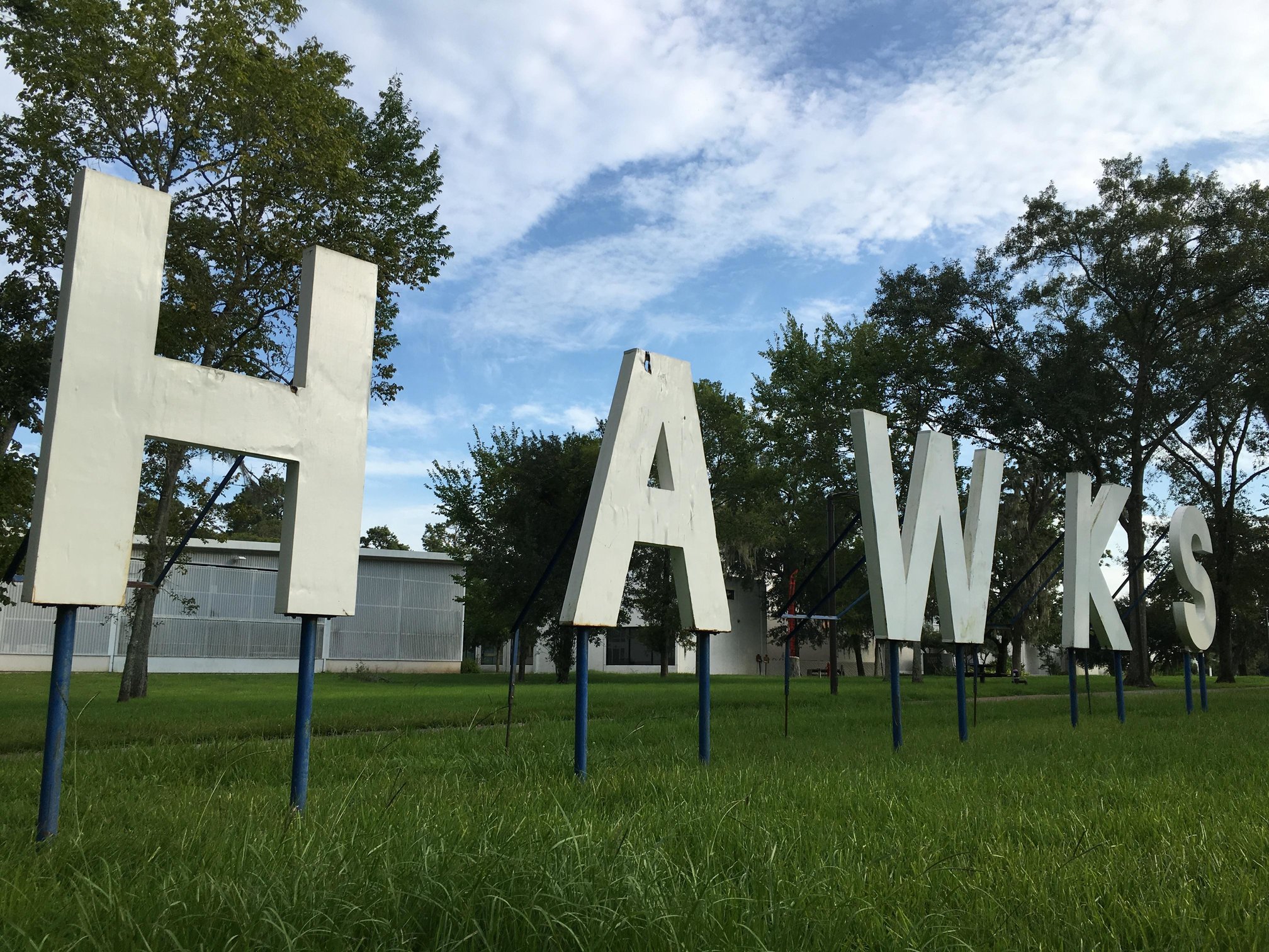 PHOTO: Hawks signage at entrance of UHCL. Photo by The Signal reporter Demetria Ledesma.