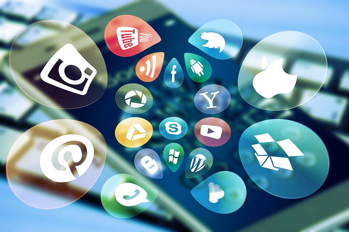 IMAGE: Social media icons coming out of phone. Image courtesy of Gerd Altmann from Pixabay.