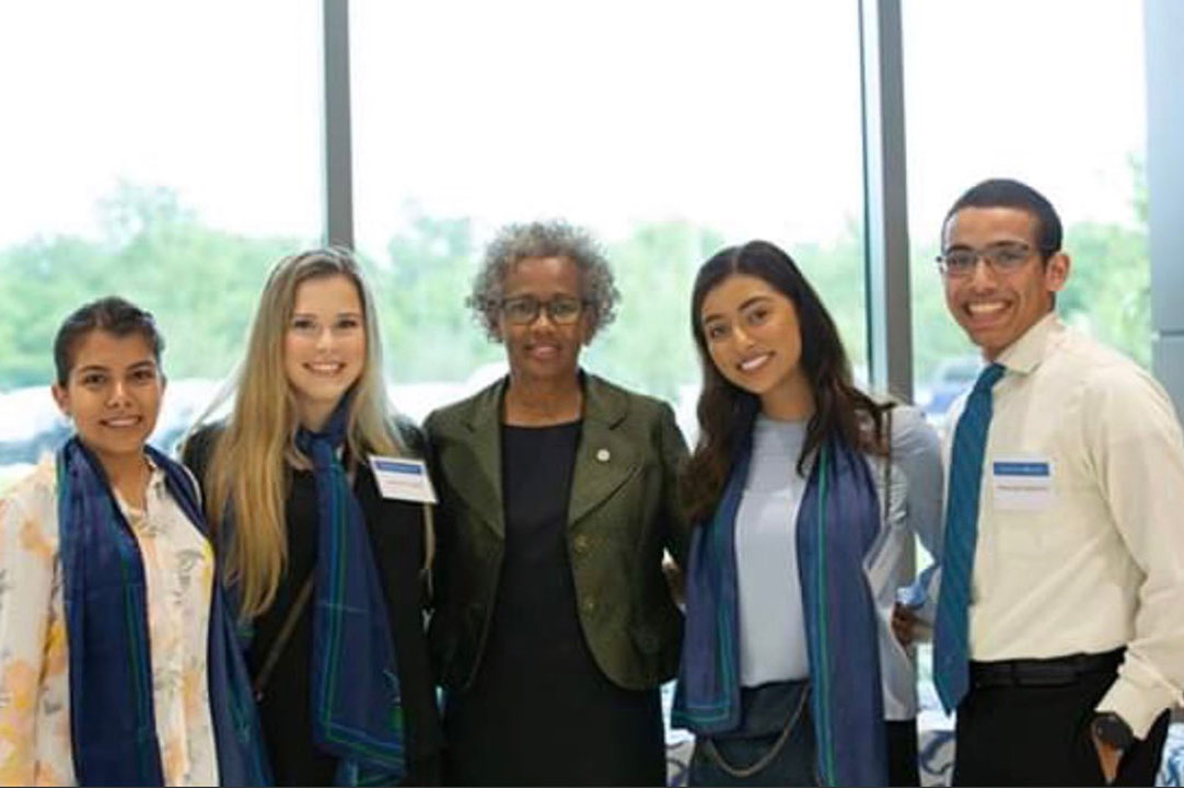 SGA poses with UHCL President.
