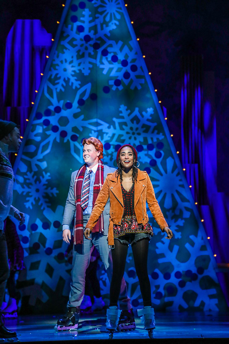 PHOTO: Quinn VanAntwerp as “Buddy" and Raven Justine Troup as “Jovie” in the Theatre Under The Stars production of Elf - The Musical. Photo by Melissa Taylor; courtesy of TUTS.