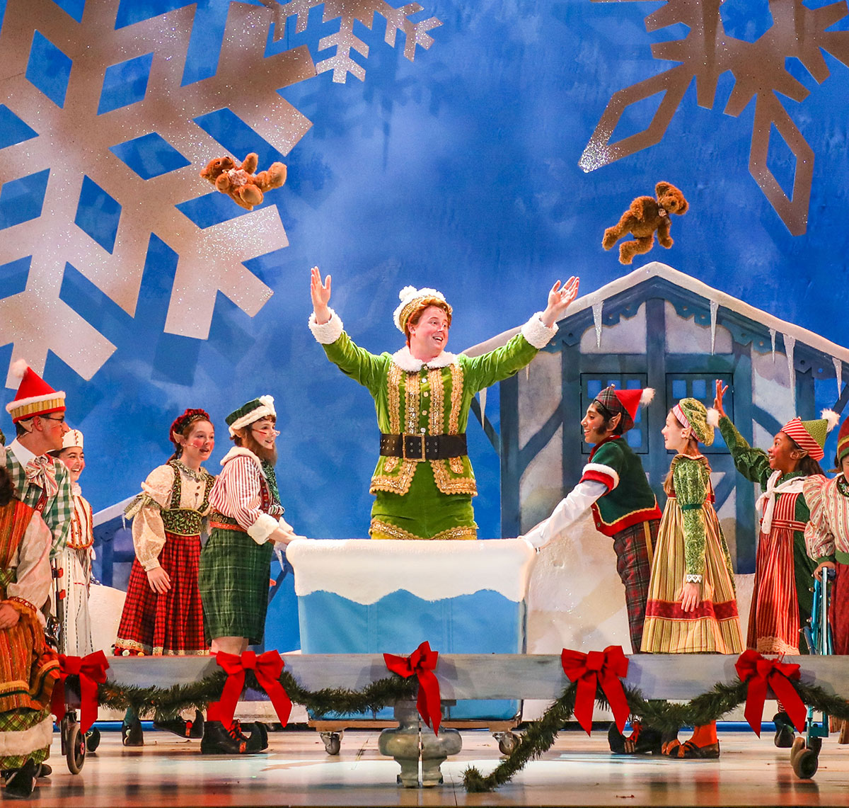 PHOTO: Quinn VanAntwerp as “Buddy” and the cast of the Theatre Under The Stars production of Elf - The Musical. Photo by Melissa Taylor, courtesy of TUTS.