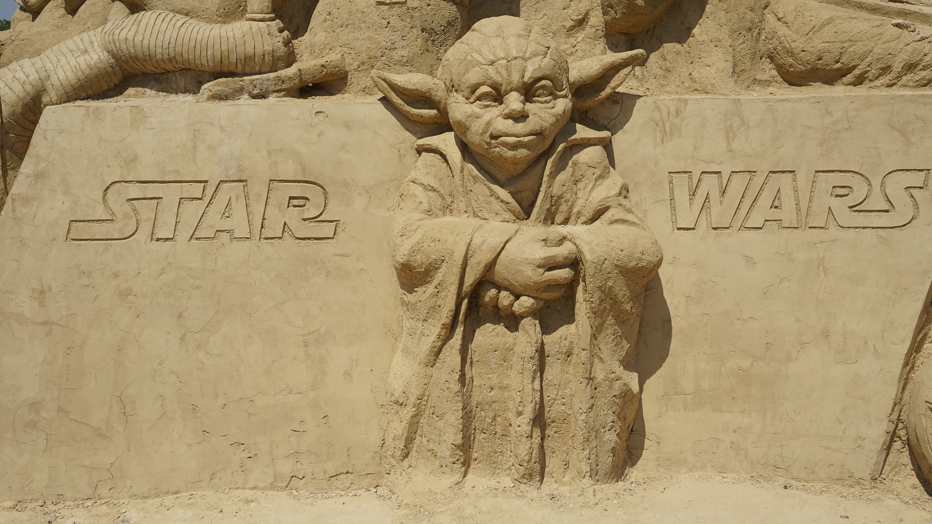 PHOTO: Artwork made from sand featuring Yoda. Photo courtesy of mihailmihailovol from Pixabay.