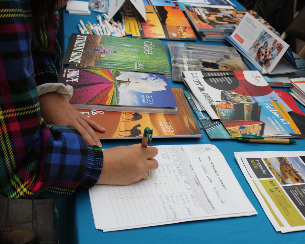 PHOTO: A students signing up to receive emails from a student organization. Photo by: The Signal reporter Aimee Kubena.