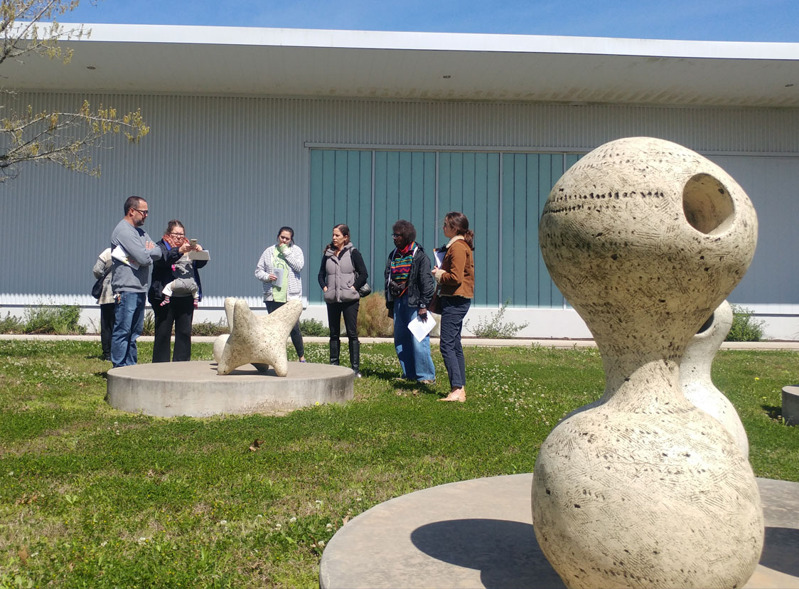 Audience gathered around sculpture. Photo courtesy of Public Art of the University of Houston System.