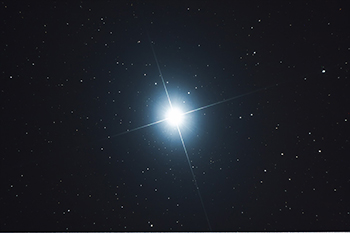 GRAPHIC: Graphic depicts Sirius, the brightest star in the night sky, shining brightly against a starry, black, night sky background.