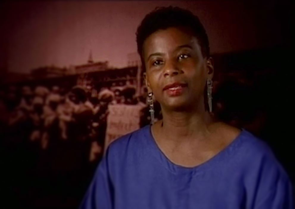 IMAGE: Demita Frazier speaking 2013 film. Image courtesy of Russo's film. SOURCES: http://catherinerussodocumentaries.com/index.html & https://www.cliohistory.org/click/library/film-clips/politics-social/?video=3757