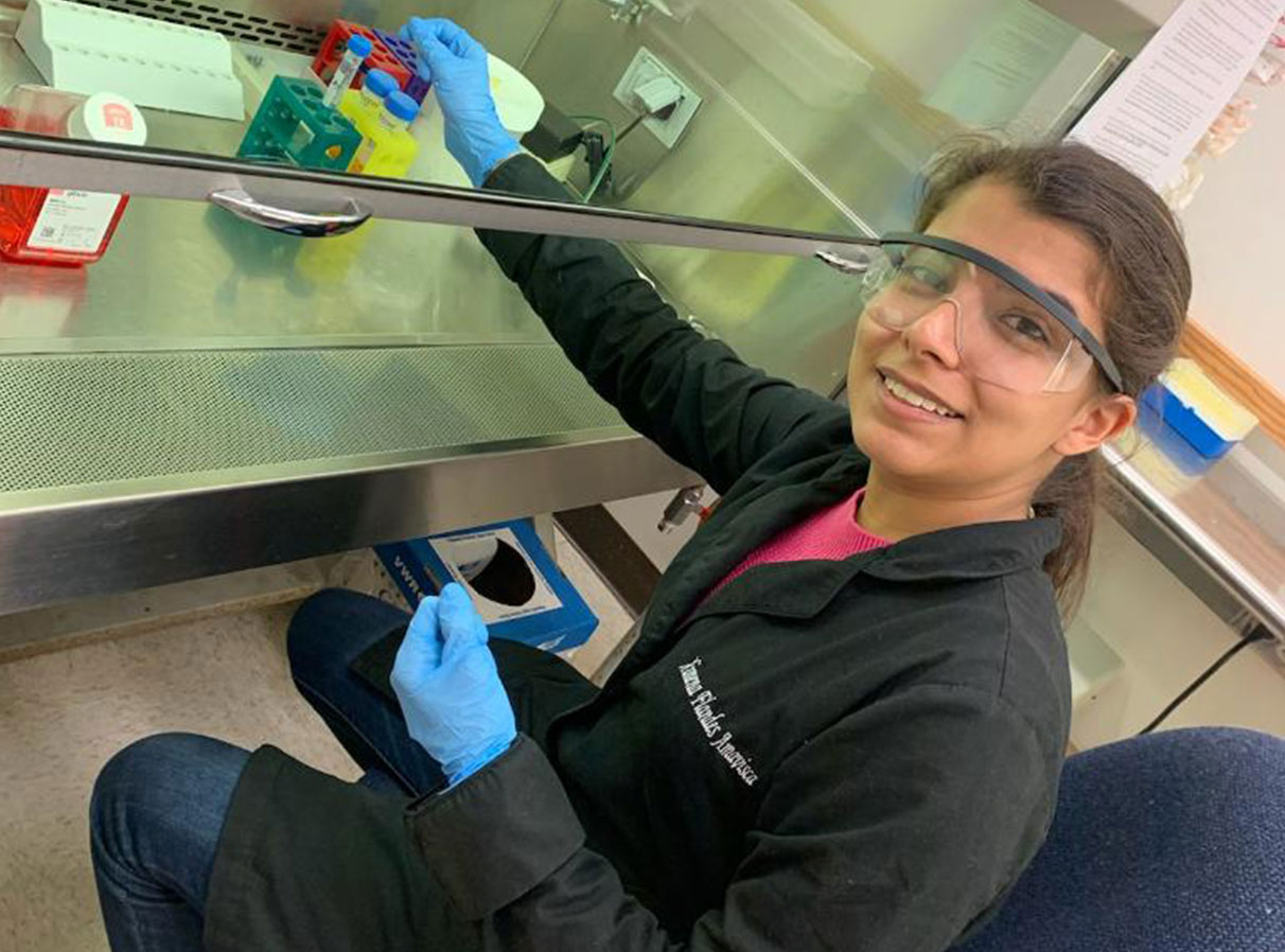 PHOTO: Ximena Flandes working in the Tissue Culture lab. Photo courtesy of Ximena Flandes.