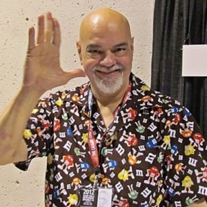 PHOTO: This is a photo of a Latinx author named George Perez. Photo Courtesy of 5of7 via Creativecommons.org. SOURCE: https://search.creativecommons.org/photos/e1b7e274-88b0-4eab-af3e-60489b7928d9