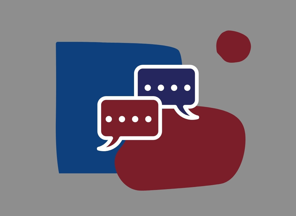 GRAPHIC: A blue blob and a red blob on a gray background with a blue and a red discussion bubble on top. Graphic by Editor-in-Chief Emily Nichelle Wolfe.