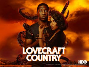 POSTER: Castmates Johnathan Majors and Jurnee Smollett stand in front of the text 'Lovecraft Country.' Poster courtesy of HBO. SOURCE: https://www.hbo.com/lovecraft-country