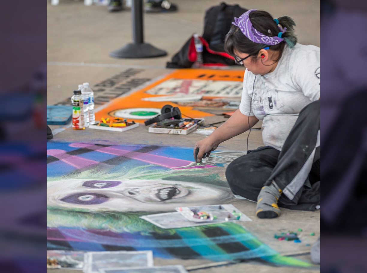 PHOTO: Lily Alonso participating in the 2018 Kerryville Chalk Festival. Photo courtesy of Lily Alonso.