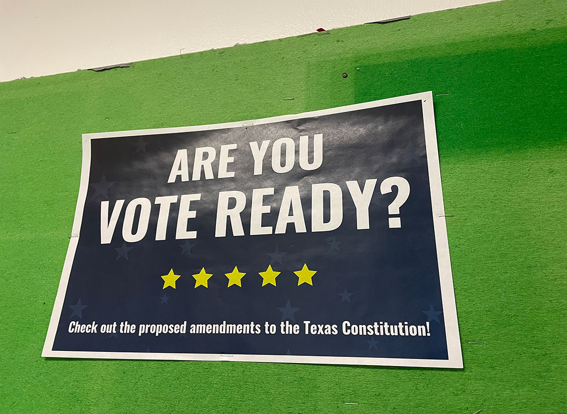 PHOTO: Image depicts blue flyer that says, "ARE YOU VOTE READY?" and the words, "Check out the proposed amendments to the Texas Constitution!" Photo by The Signal Managing Editor of Content & Operations Troylon Griffin II.