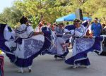 Purple Dresses dancing at The Ballet Folklorico. Photo by Signal reporter Xavier Munoz.
