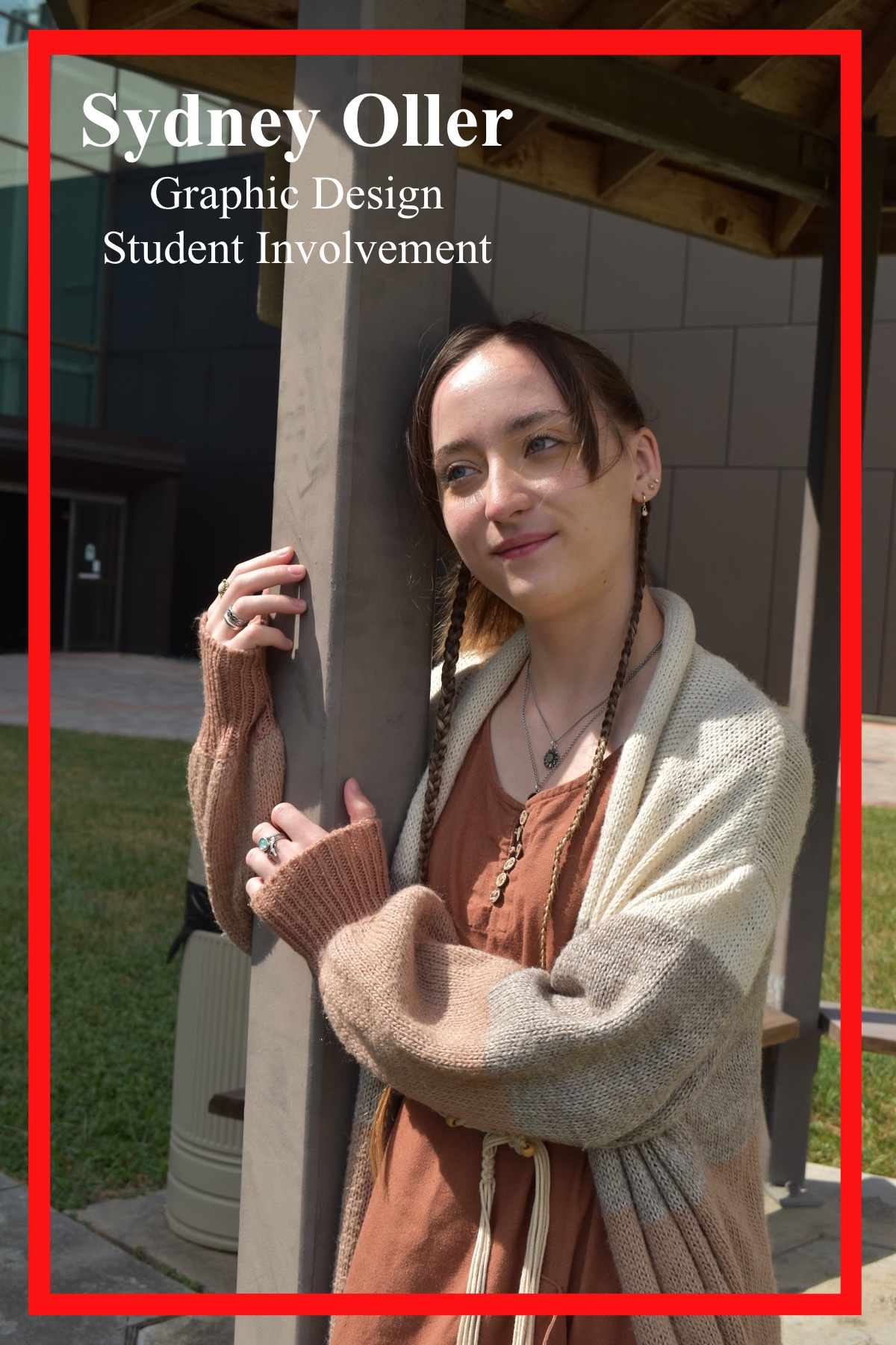 Sydney Oller, Graphic Design Major and Student Involvement worker, resting their head in a pillar of gazebo outside of SSCB. She dons on a neutral color blocked cardigan overtop a warm brown dress, with a braided rope belt.