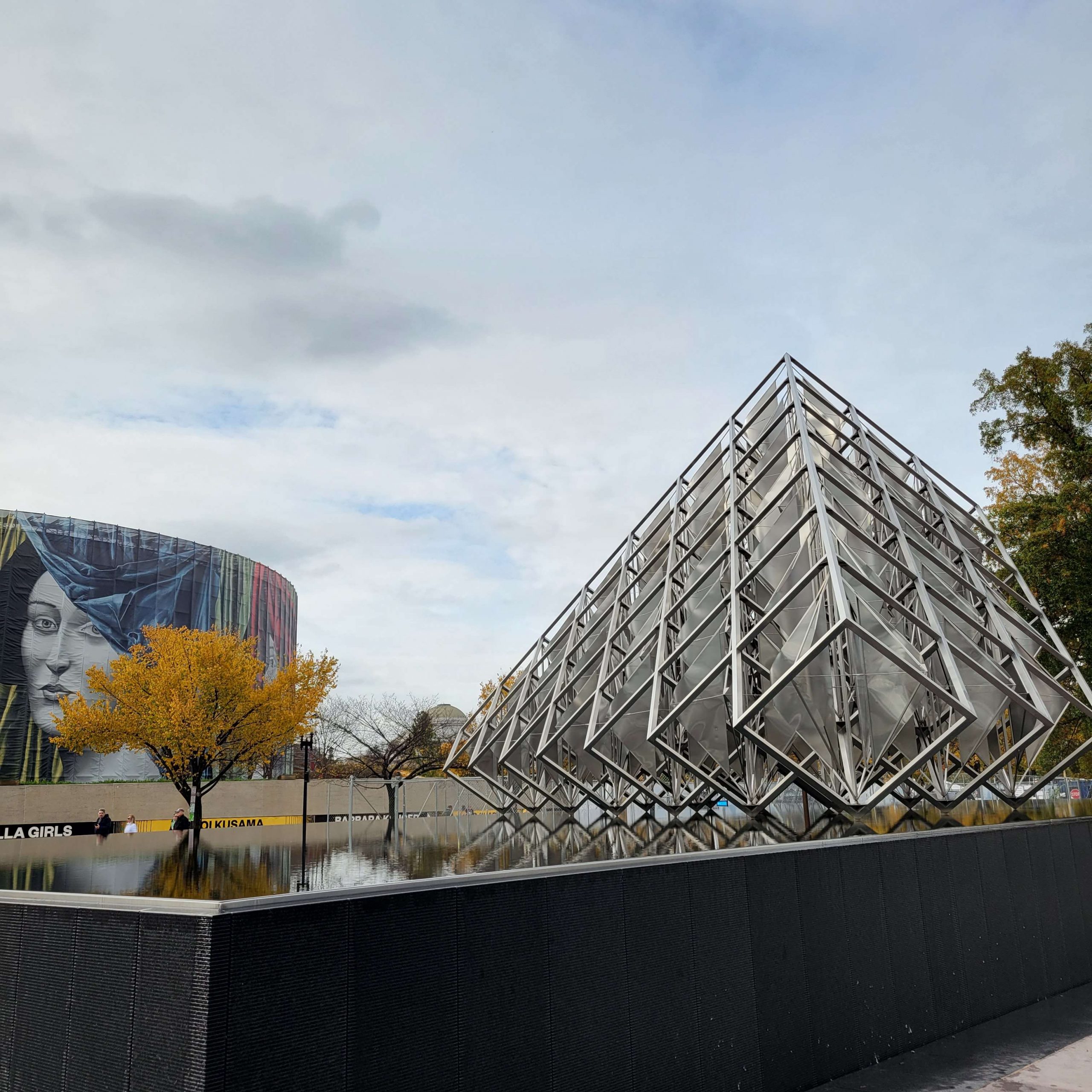 A silver modern triangular sculpture in front of the Smithsonian National Air and Space Museum.Photo by The Signal Reporter Karsyn Coxie.