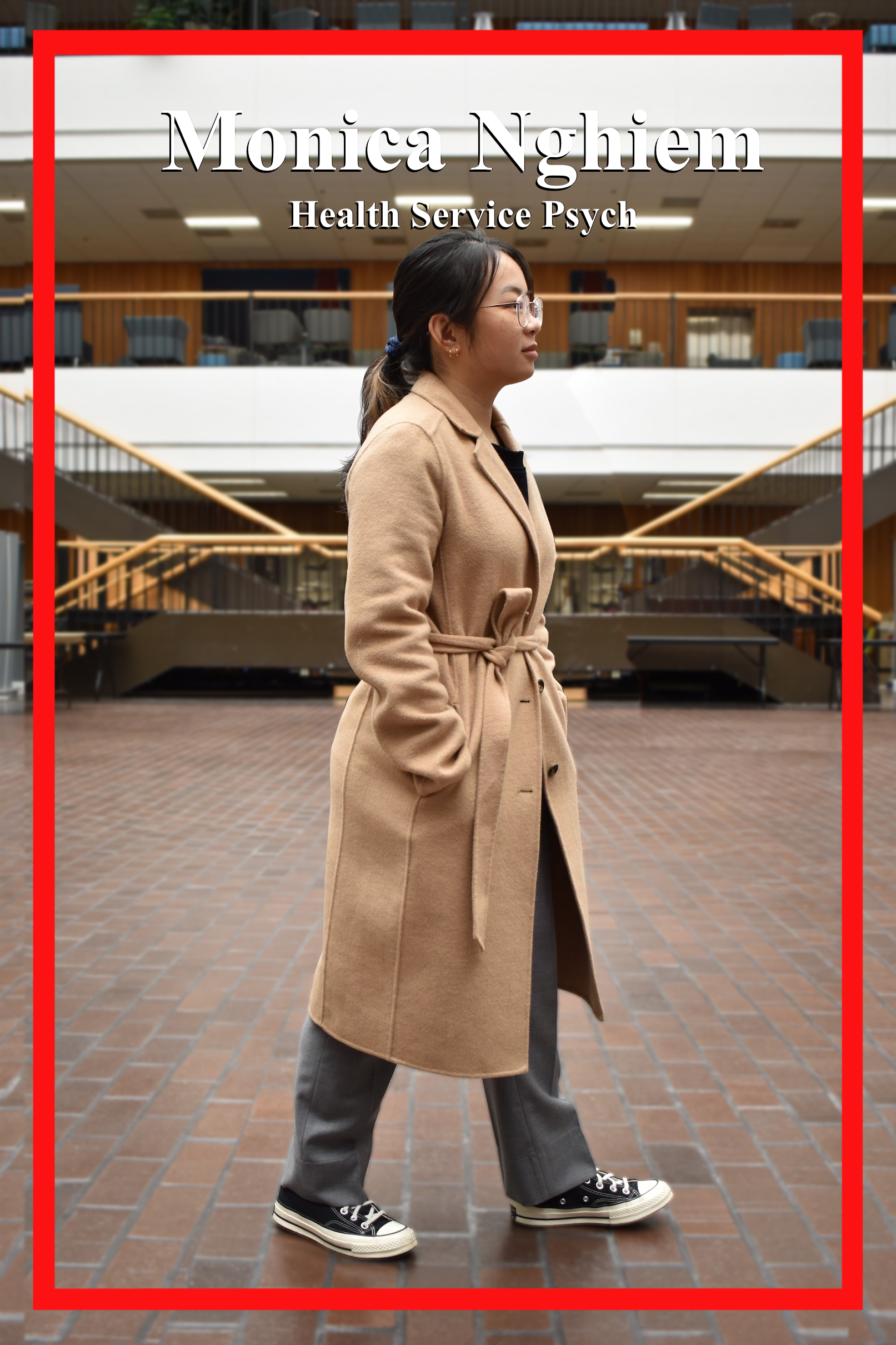 Monica Nghiem, Health and Service Psych Major, standing in front of Bayou Stairs dressed a soft tan trench coat with grey slacks and converse.