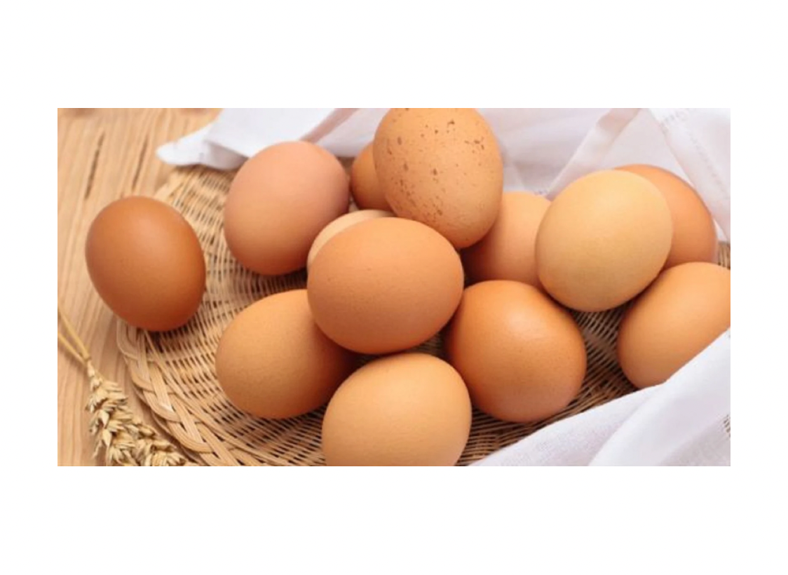 Photo depicts multiple eggs in a basket.