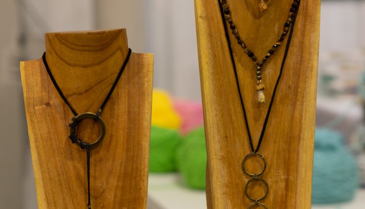 Handmade necklaces on display